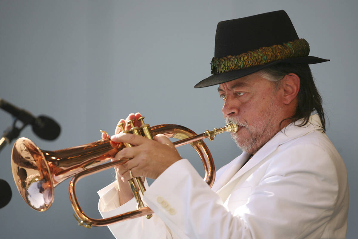 FILE - In this June 18, 2006 file photo, Chuck Mangione performs during the Playboy Jazz Festiv ...