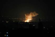 Smoke rises after an explosion in Tehran, Iran, Friday, June 13, 2025. Israel attacked Iran's c ...