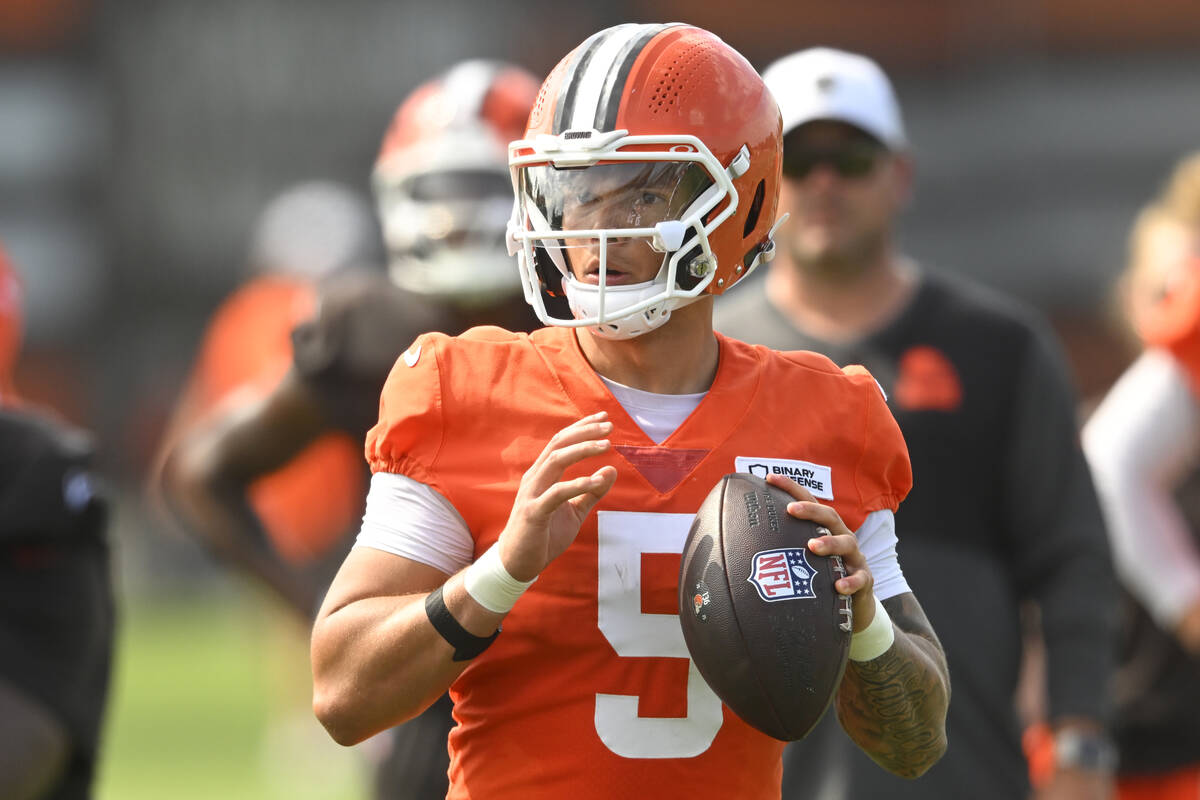 Cleveland Browns quarterback Dillon Gabriel (5) looks to pass during a practice at the team's N ...