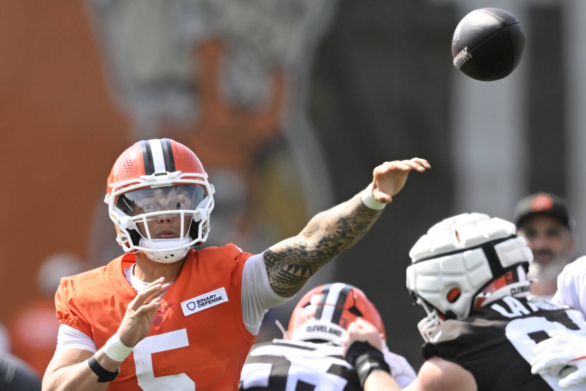 Cleveland Browns quarterback Dillon Gabriel (5) throws a pass during a practice at the team's N ...