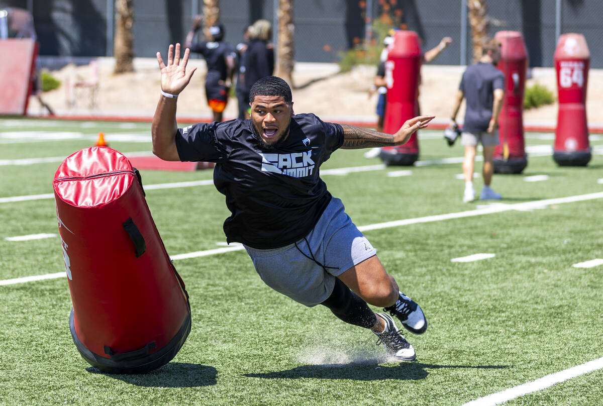 Raiders defensive end Jonah Laulu runs through a drill during Sack Summit 2025 at the UNLV Fert ...