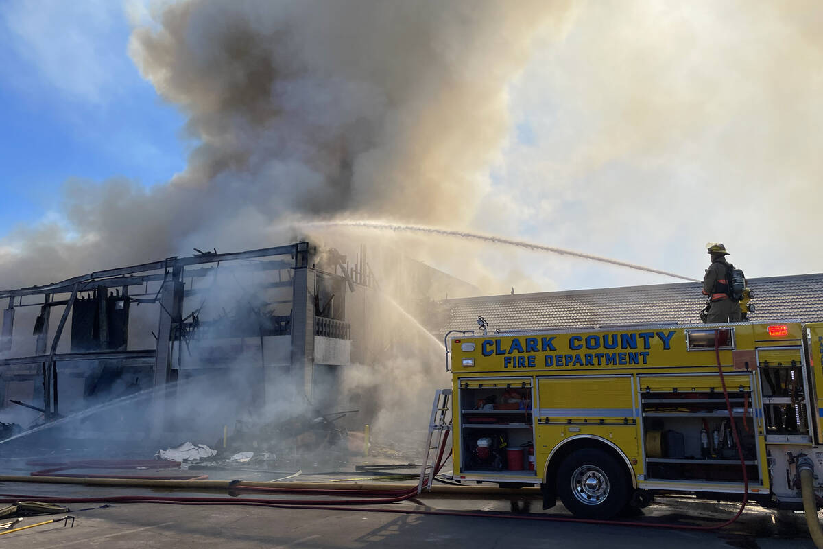 Clark County firefighters work to put out a three-alarm building fire on the 4600 block of Mary ...