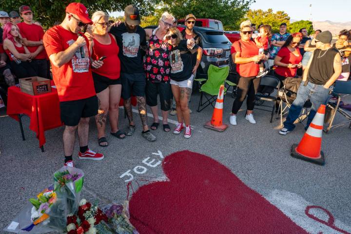 Kurtis Hatherly, older brother of Joey Perry, speaks to the crowd gathered for a candlelight vi ...