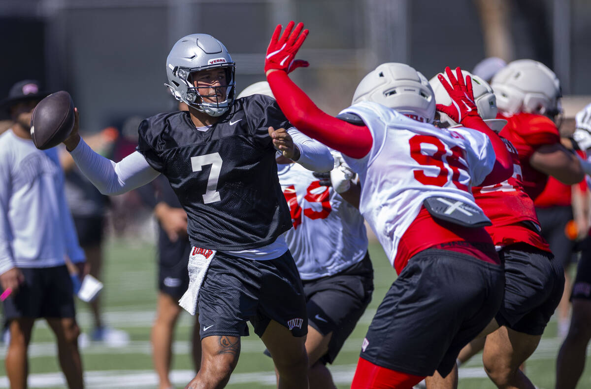 UNLV quarterback Cameron Friel (7) looks to pass during football practice at the Fertitta Footb ...