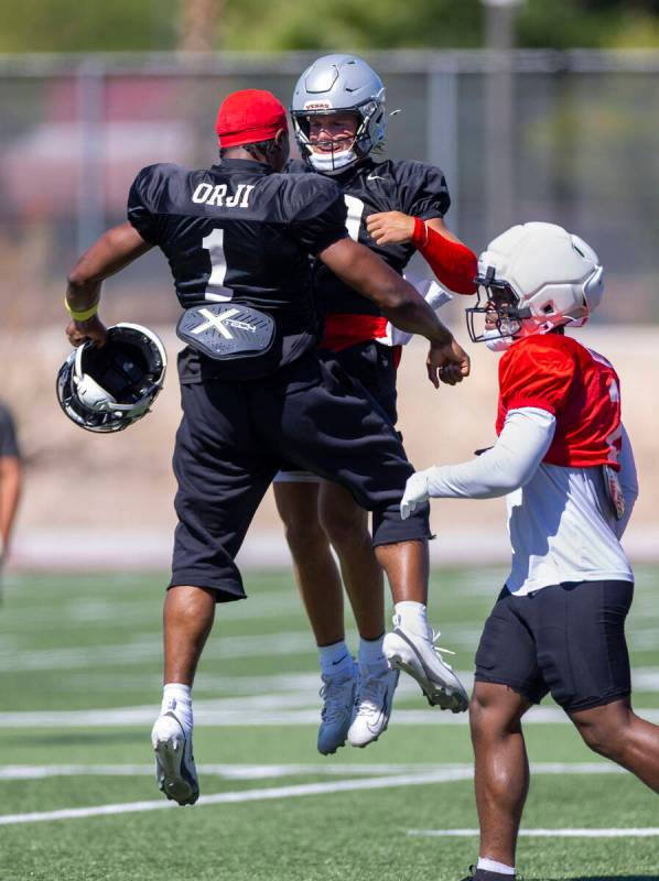UNLV quarterback Alex Orji (1) and quarterback Anthony Colandrea (10) celebrate his touchdown r ...