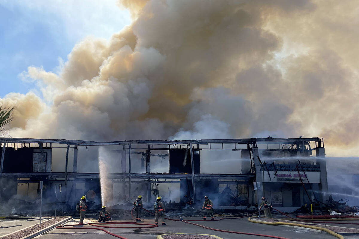 Clark County firefighters work to put out a three-alarm building fire on the 4600 block of Mary ...