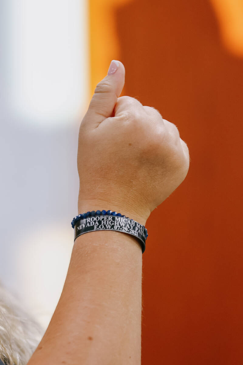 Joanna May wears a bracelet commemorating her husband, Micah May, during the Nevada Highway Pat ...
