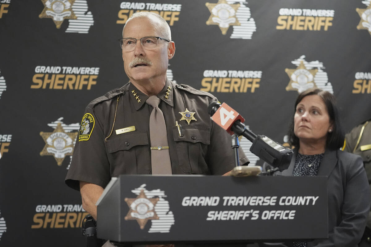 Grand Traverse County Sheriff Mike Shea, left, speaks alongside Prosecutor Noelle Moeggenberg d ...