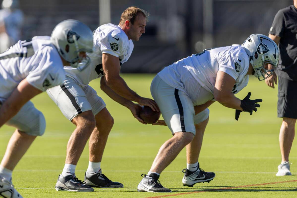 Raiders tight end Brock Bowers (89) takes a snap from center Jarrod Hufford (64) during the tea ...