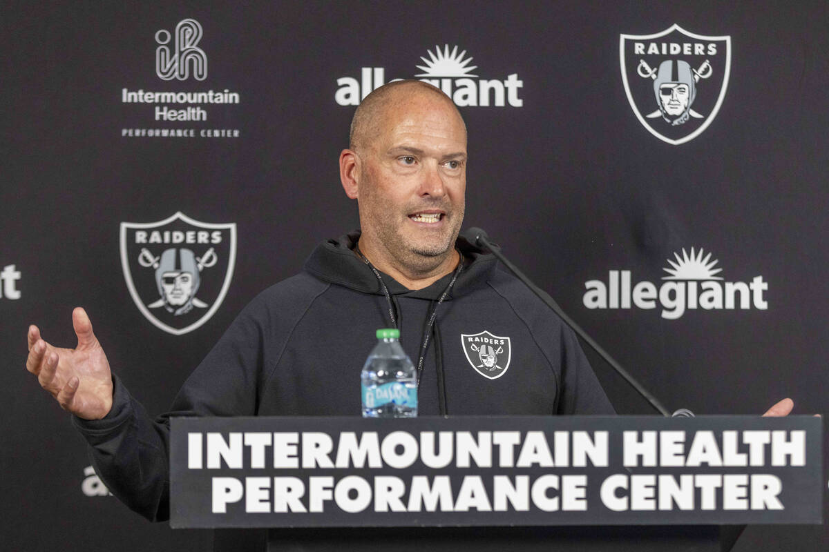 Raiders special teams coordinator Tom McMahon gestures during a news conference after the team& ...