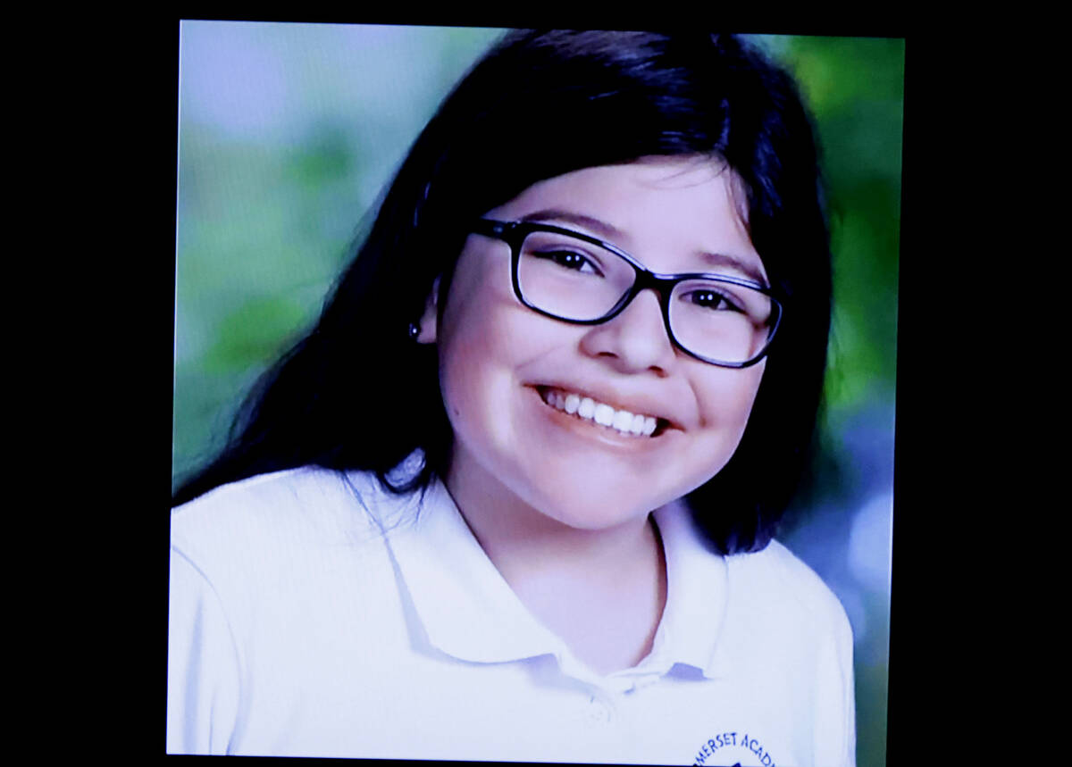 A photograph of a shooting victim Angelina Erivas is displayed during the trial of Isaac George ...