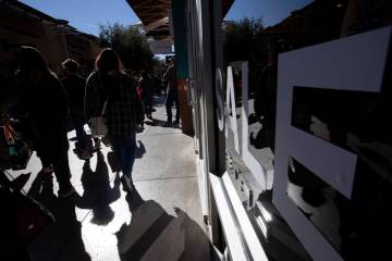 Shoppers crowd the Las Vegas North Premium Outlets for Black Friday sales on Friday, Nov. 25, 2 ...