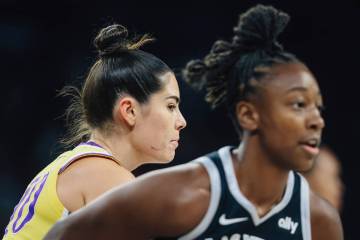 Los Angeles Sparks guard Kelsey Plum (10) eyes Aces guard Jewell Loyd during a WNBA game betwee ...