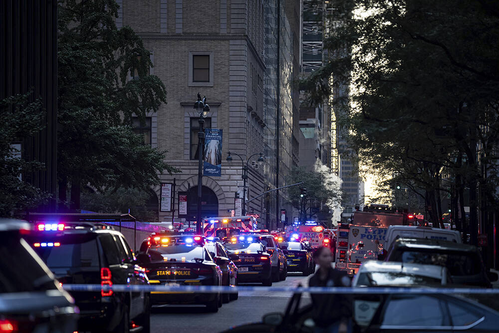 The scene on 52nd Street between Park and Lexington Avenue where a New York Police Department p ...