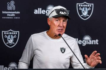 Raiders head coach Pete Carroll answers a question during an interview on the third day of trai ...