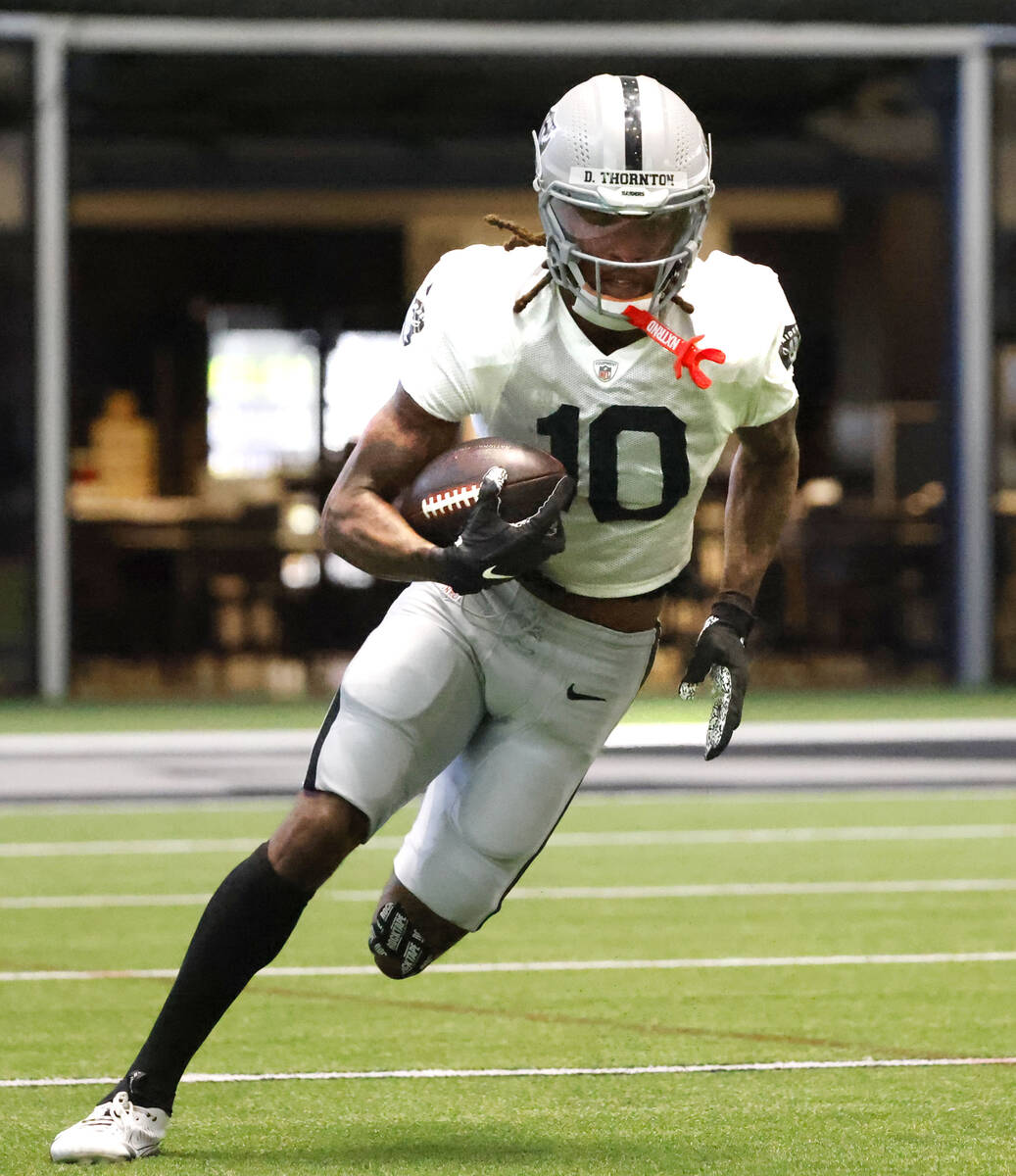 Raiders wide receiver Dont'e Thornton Jr. (10) runs with the ball during the team’s trai ...
