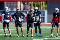 UNLV quarterback Anthony Colandrea (10) gets off a pass during football practice at the Fertitt ...