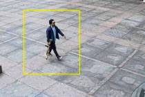 This image from surveillance video obtained by The Associated Press shows Shane Tamura outside ...