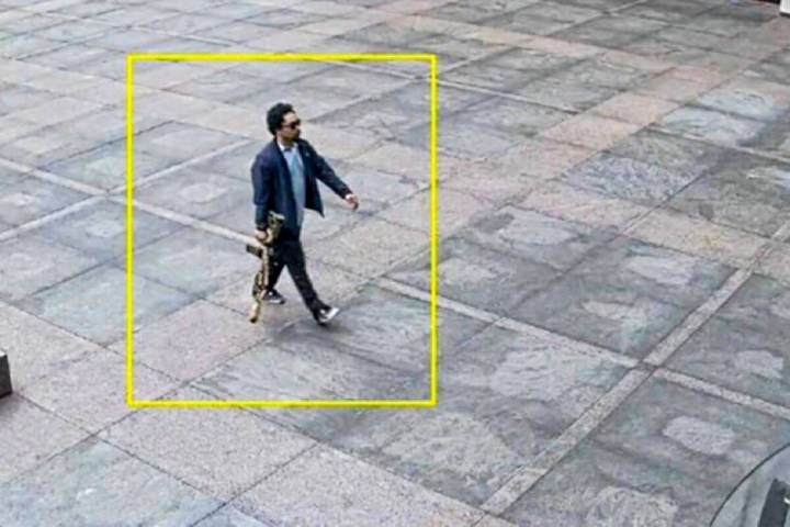 This image from surveillance video obtained by The Associated Press shows Shane Tamura outside ...