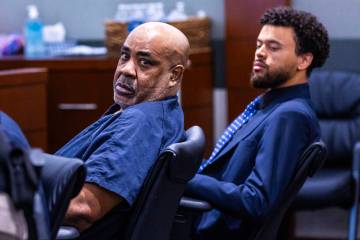 Duane Davis looks back during a hearing on claims of juror misconduct in his jailhouse battery ...
