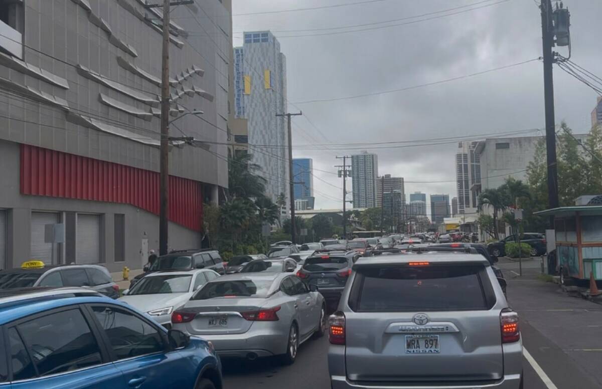 A traffic jam forms in Honolulu Tuesday, July 29, 2025 as people heed a tsunami evacuation warn ...