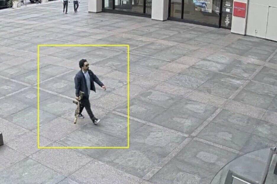 This image from surveillance video obtained by The Associated Press shows Shane Tamura outside ...