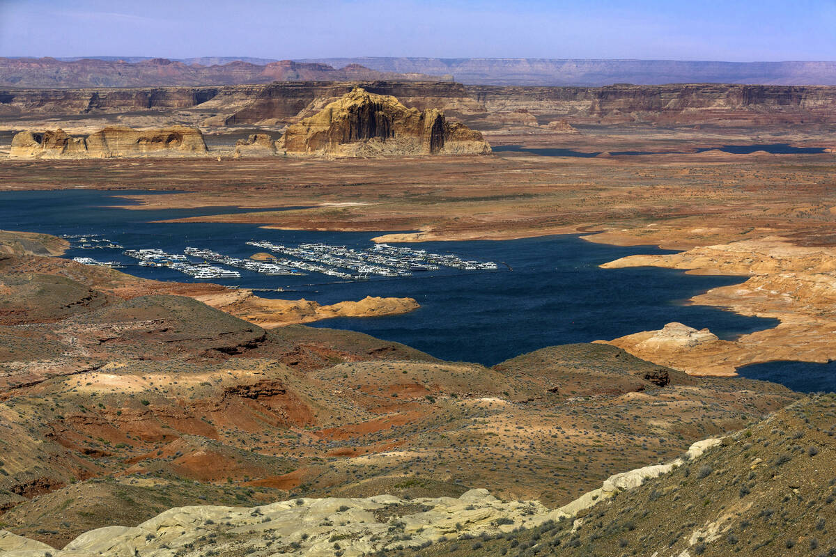 The dwindling Lake Powell fed by the Colorado River on Tuesday, April 18, 2023, in Page, Ariz.( ...