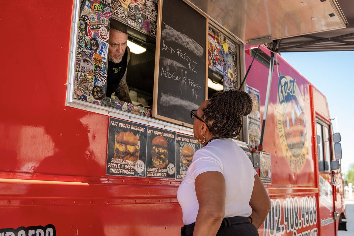 Michele Clark visits Fast Eddie’s Burgers food truck parked in front of MountainView Hos ...
