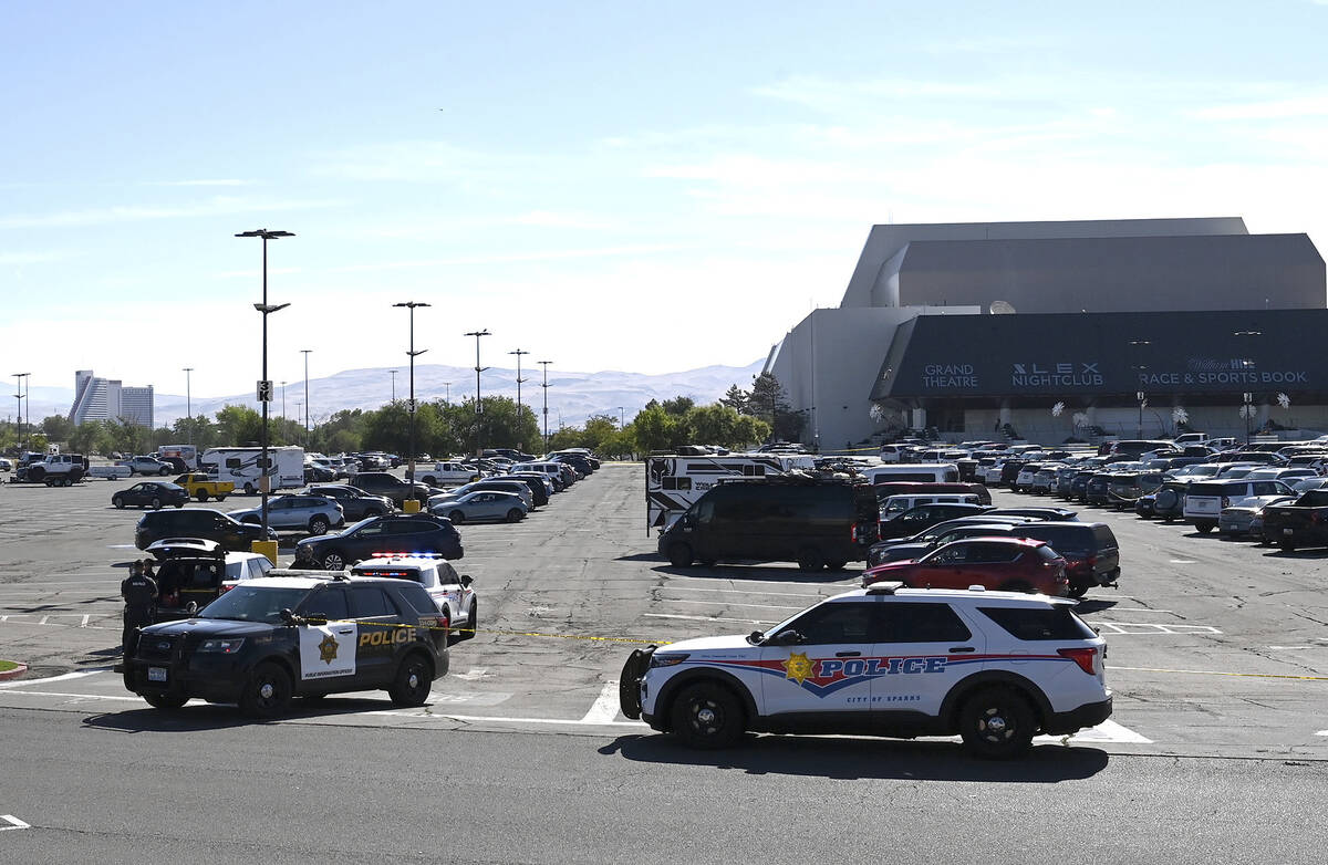 Police respond to a shooting outside the Grand Sierra Resort in Reno, Nev., Monday, July 28, 20 ...