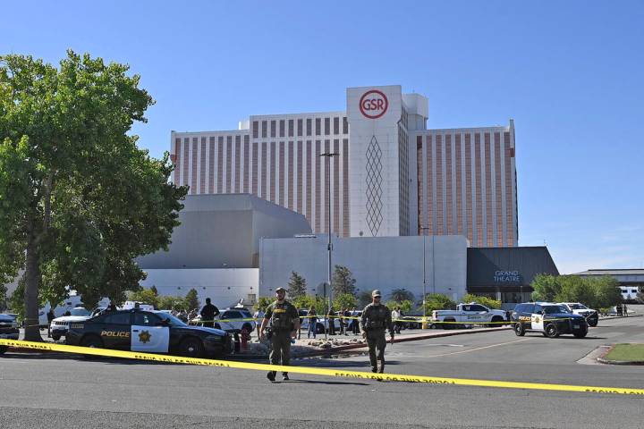 Police respond to a shooting outside the Grand Sierra Resort in Reno, Nev., Monday, July 28, 20 ...