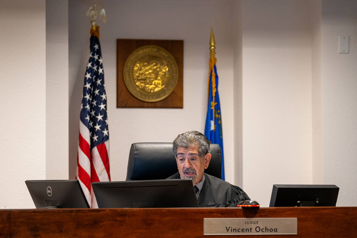 Judge Vincent Ochoa delivers the results of a paternity test during a hearing at the Family Cou ...