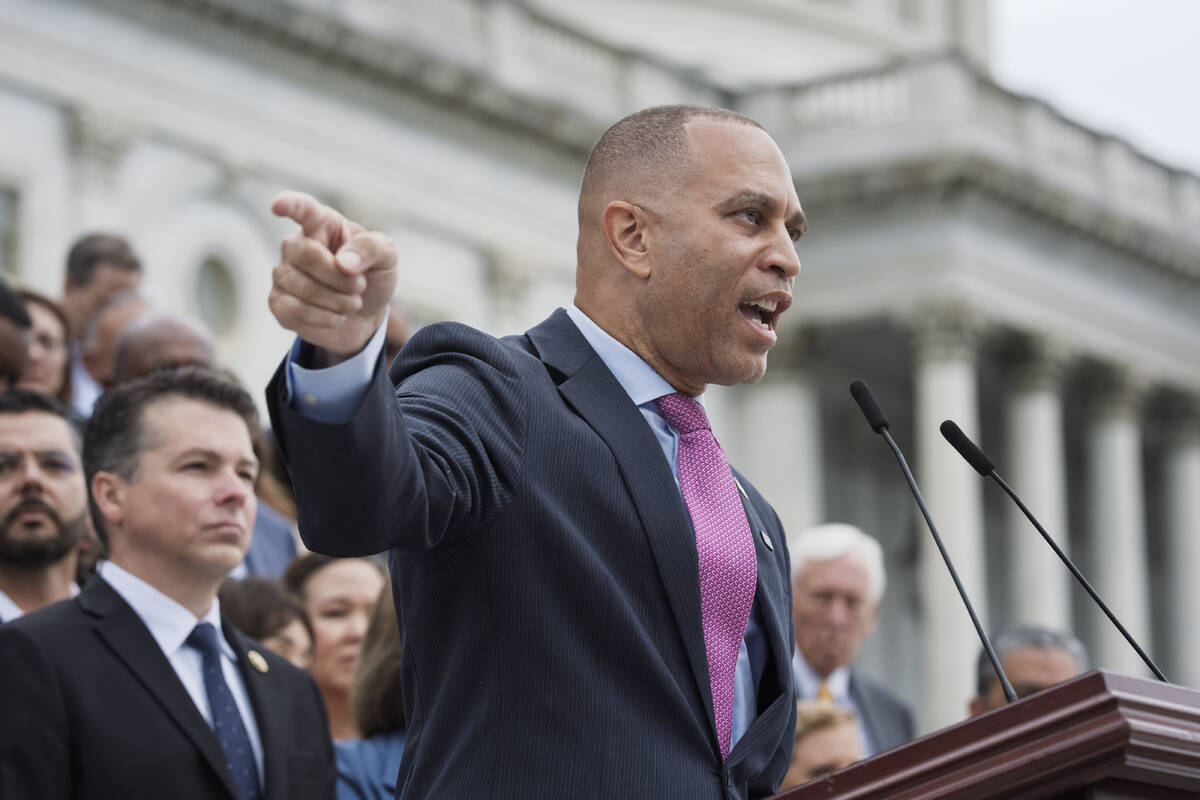 House Minority Leader Hakeem Jeffries, D-N.Y., and the Democratic Caucus, assemble on the steps ...