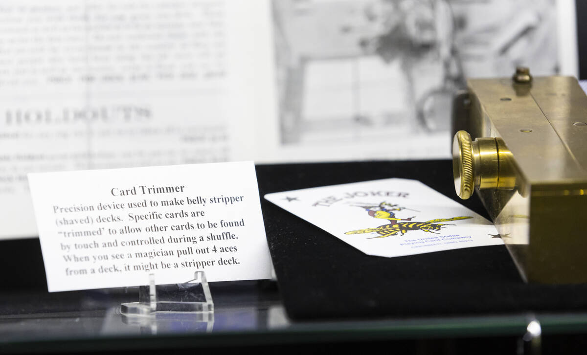 A card that was trimmed is seen in a display case from the Museum of Gaming History that featur ...