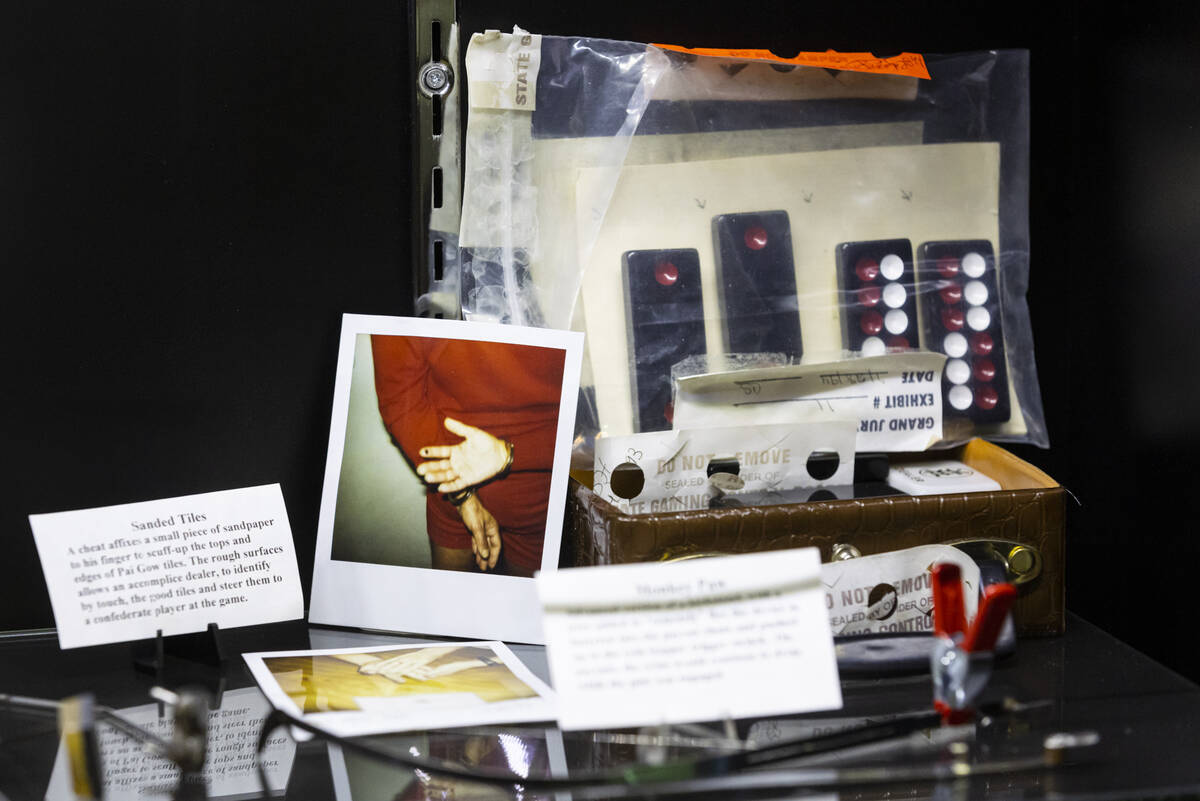Sanded Pai Gow tiles are seen in a display case from the Museum of Gaming History that featured ...