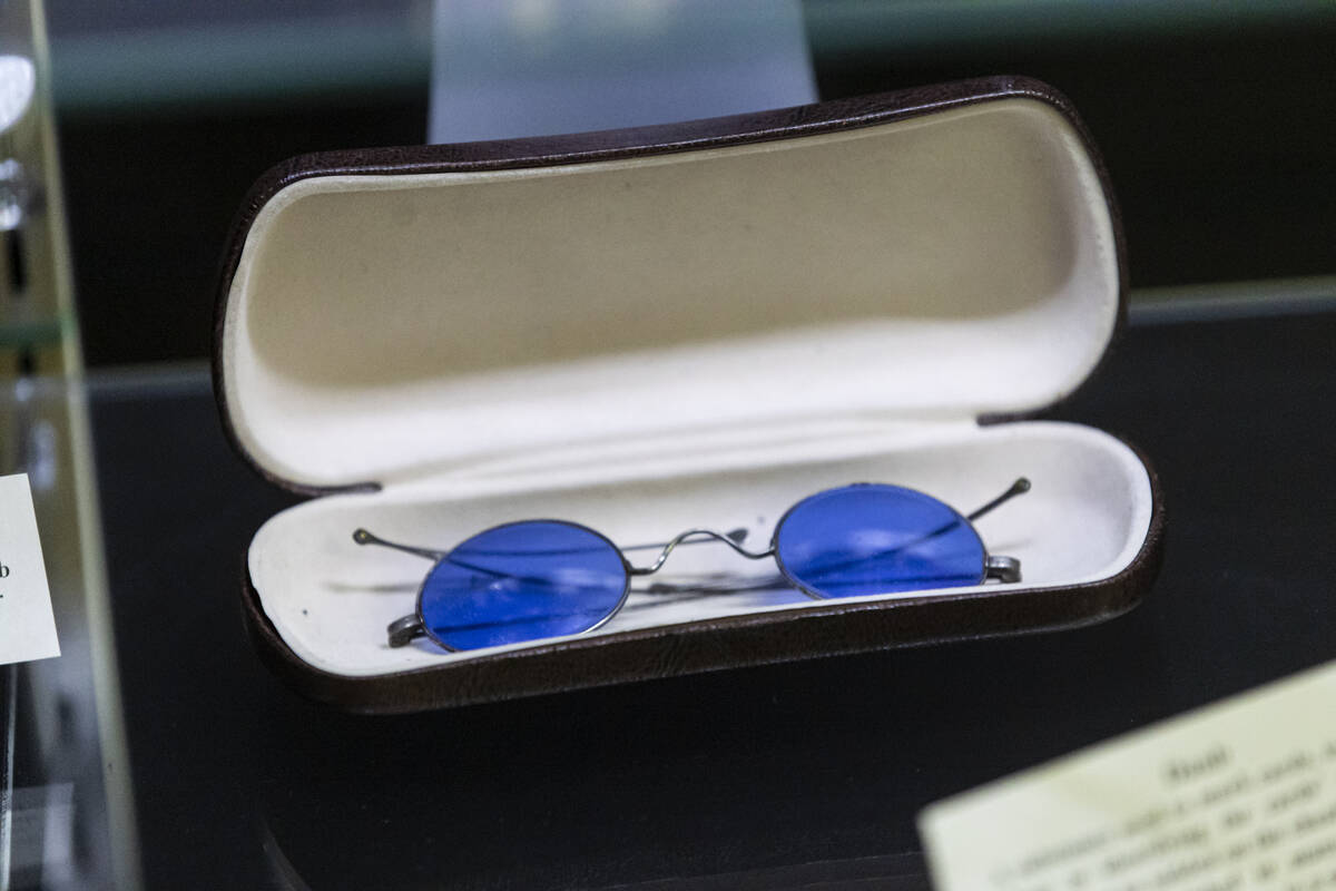 Blue “cheater glasses” from the late 1800s, which allowed users to track marked c ...