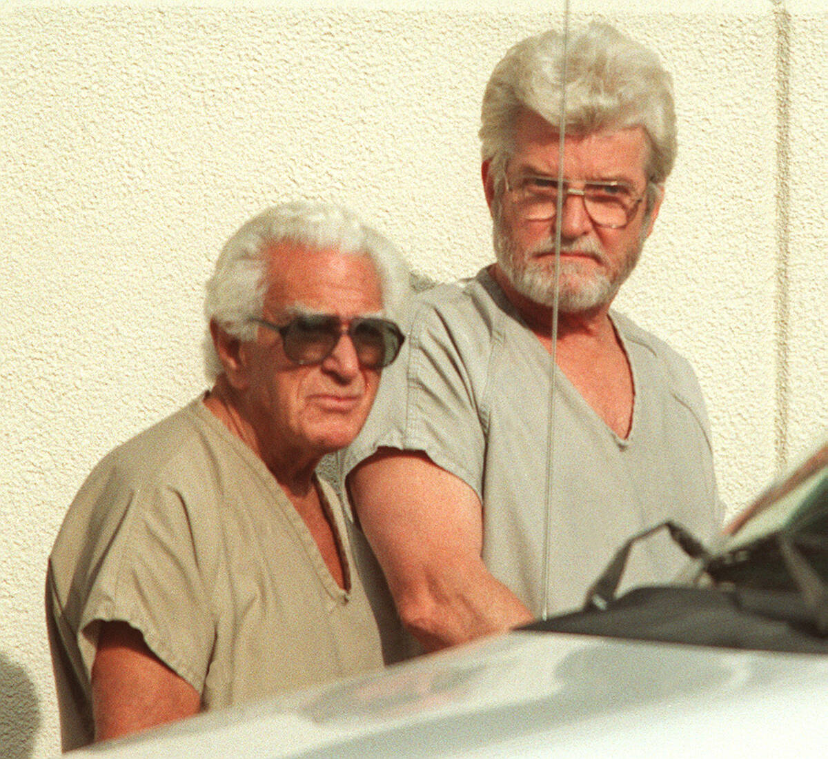 Samuel Manarite, left, and Dennis Nikrasch leave Federal Court on June 15, 1998. (Las Vegas Rev ...