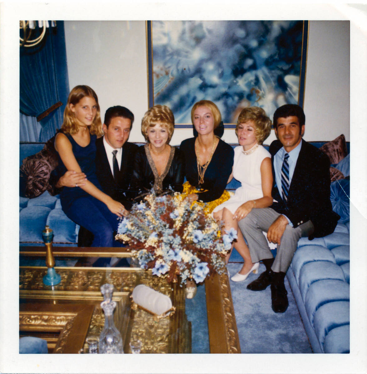 Seated on a couch in the Las Vegas home of casino executive Frank "Lefty" Rosenthal, from left, ...
