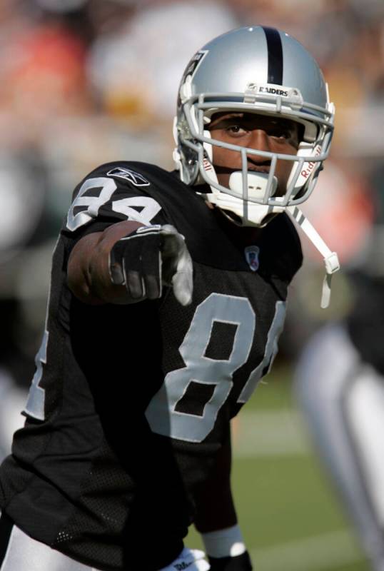 ** FILE ** Oakland Raiders wide receiver Jerry Porter points during an NFL football game agains ...