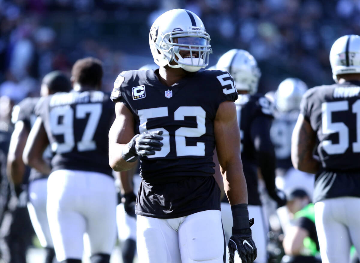 Oakland Raiders defensive end Khalil Mack (52) takes the field for warm up drills prior to the ...