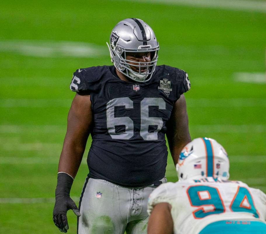 Raiders offensive guard Gabe Jackson (66) sets up against Miami Dolphins defensive end Christia ...