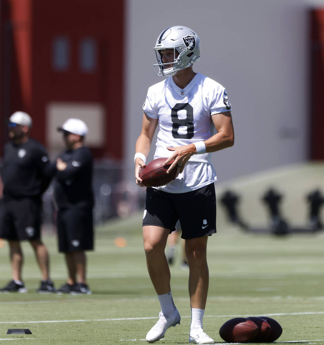 Raiders kicker Daniel Carlson (8) takes the field during an NFL mandatory football minicamp at ...
