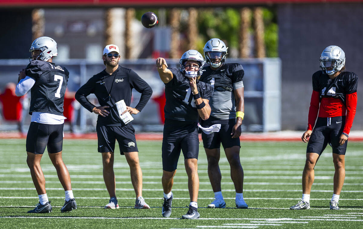UNLV quarterback Anthony Colandrea (10) gets off a pass during football practice at the Fertitt ...