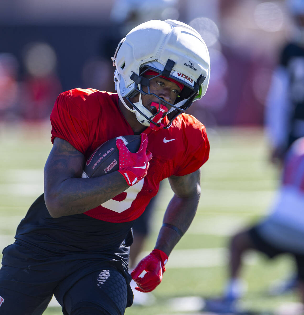 UNLV running back Jai'Den Thomas (9) runs up the field after breaking free of the line during f ...