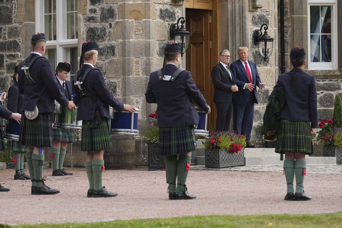 A pipes and drum band plays as President Donald Trump and Britain's Prime Minister Keir Starmer ...