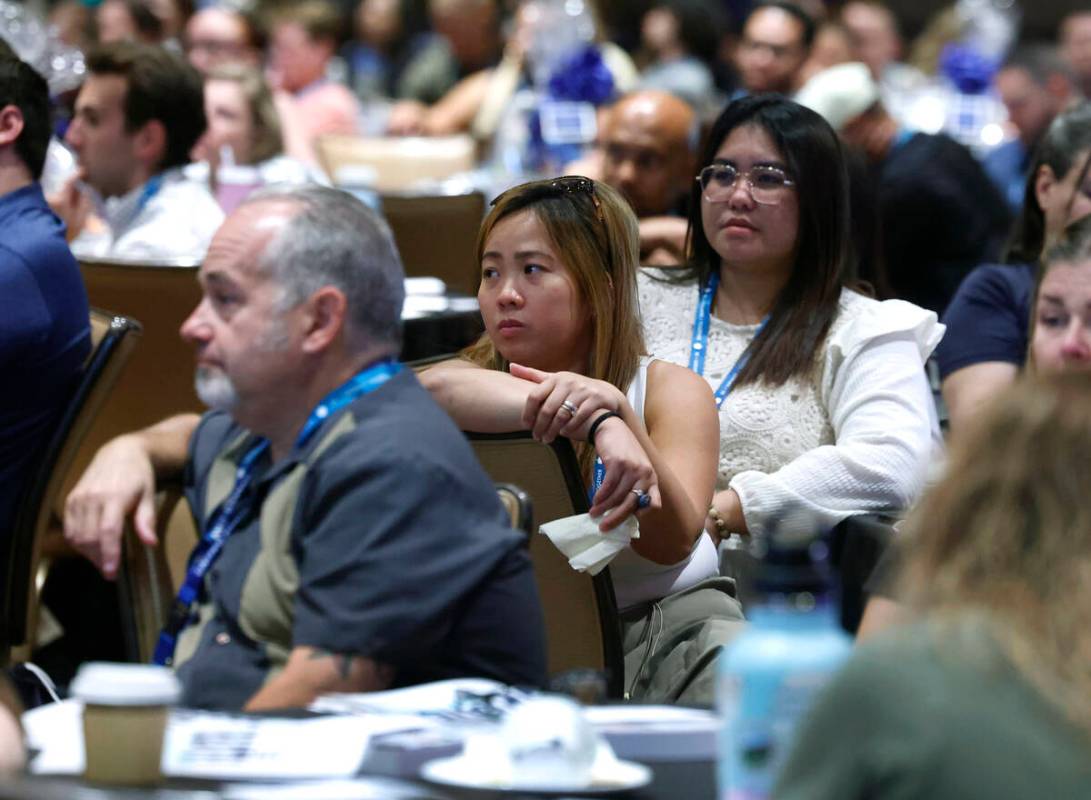 Timothy Morales, left, who will be teaching at Spring Valley High School, Ma Fenella, center, a ...