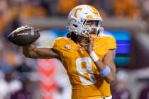 Tennessee quarterback Nico Iamaleava prepares to throw to a receiver during the first half of a ...