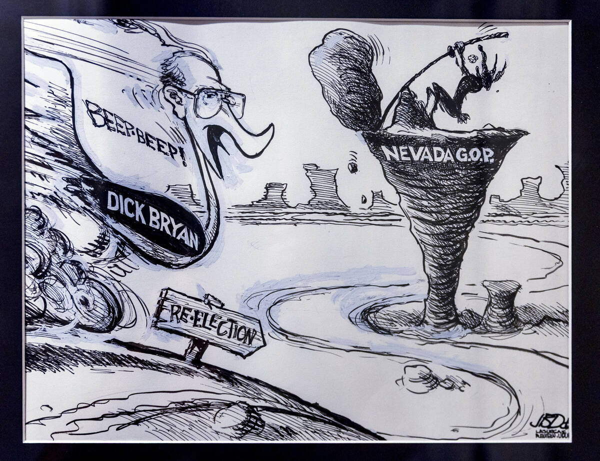 A favorite cartoon featuring former Nevada Governor and U.S. Senator Richard Bryan hangs on the ...