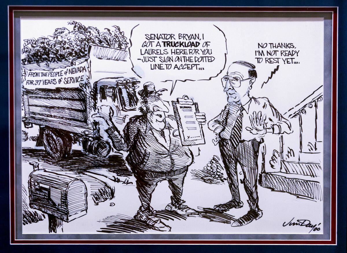 A favorite cartoon featuring former Nevada Governor and U.S. Senator Richard Bryan hangs on the ...