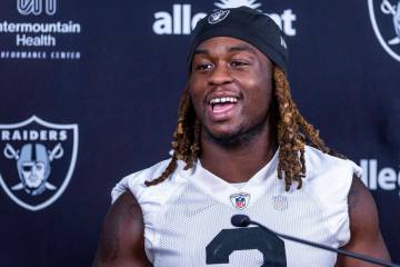 Raiders running back Ashton Jeanty (2) answers a question during an interview on the second day ...