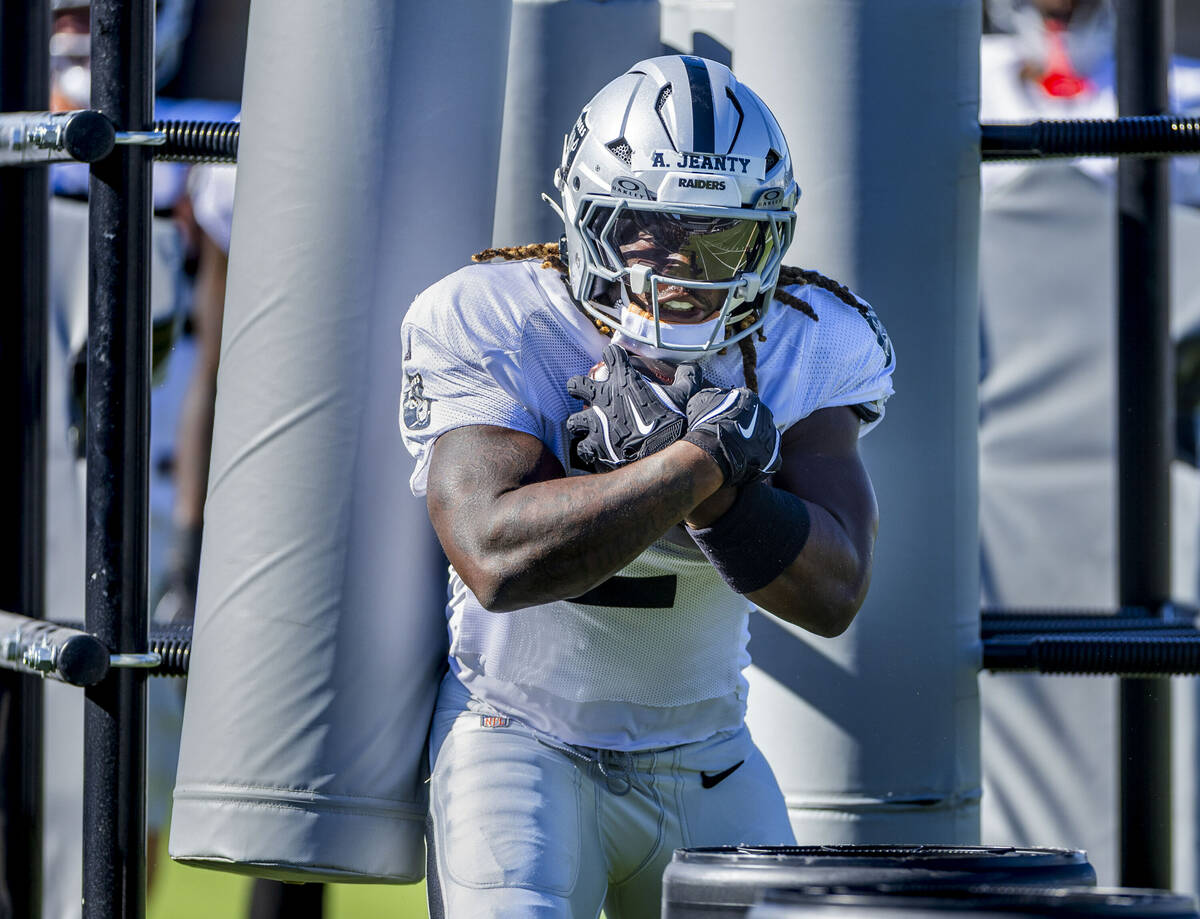 Raiders running back Ashton Jeanty (2) runs in a drill during training camp on Thursday, July 3 ...